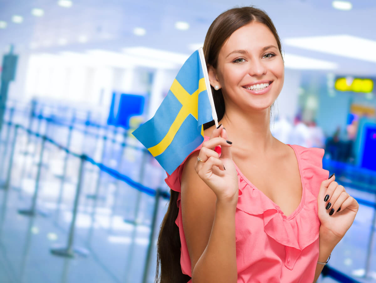 Swedish Woman Holding Swedish Flag